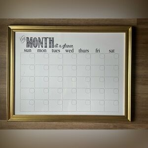 Monthly dry erase calendar.